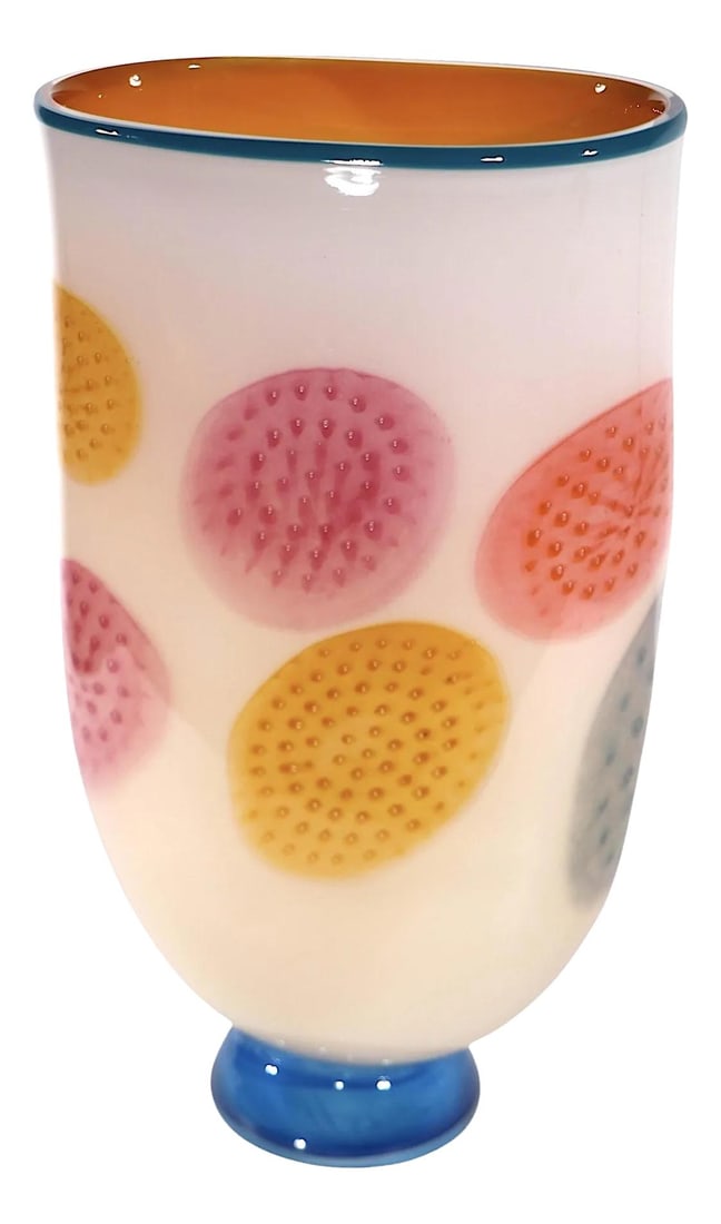 1980s Post Modern Art Glass Vase Cream Polychrome Dots: 1980s Post Modern Art Glass Vase Cream Polychrome Dots This exquisite post-modern art glass vase, crafted in the 1980s or 1990s, features a unique oval cased glass design. The body showcases a cream-c