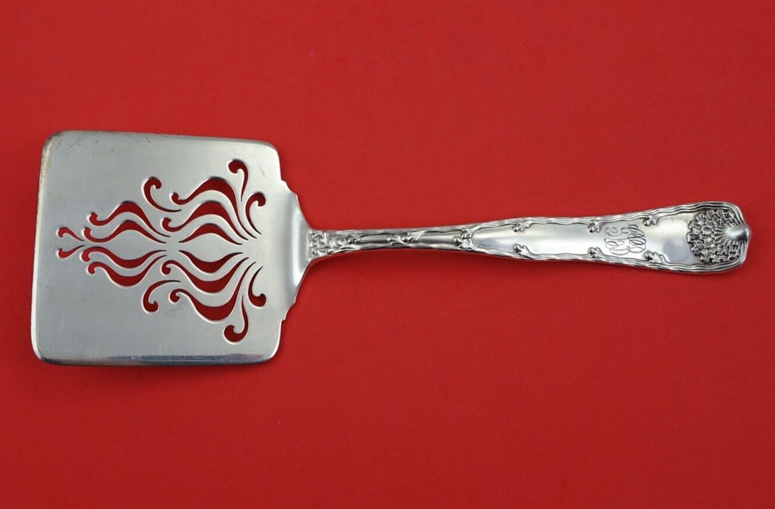Tiffany & Co Wave Edge Sterling Silver Waffle Server 9 Art Nouveau: Tiffany & Co Wave Edge Sterling Silver Waffle Server 9 Art Nouveau This exquisite 9" Wave Edge Waffle Server from Tiffany & Co. showcases a stunning Art Nouveau design, making it a perfect addition to