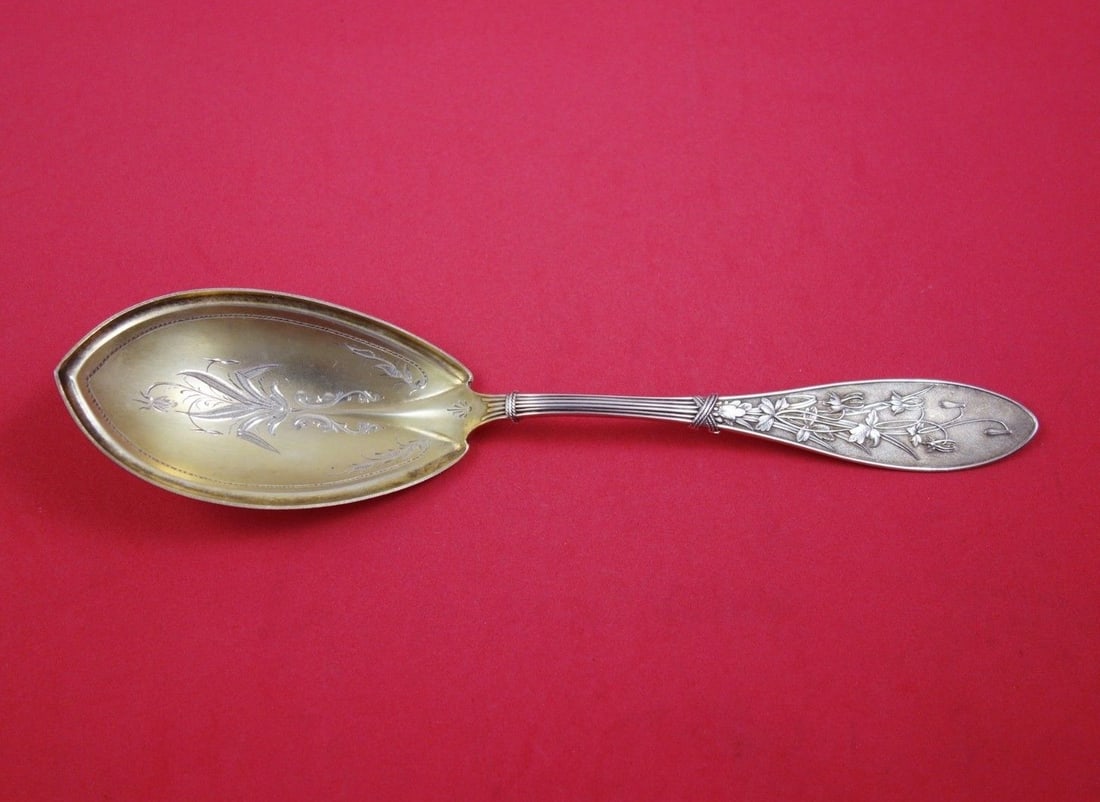 Whiting Honeysuckle Sterling Silver Berry Spoon Gold Washed 8 7/8": Whiting Honeysuckle Sterling Silver Berry Spoon Gold Washed 8 7/8" This exquisite Honeysuckle pattern berry spoon, crafted by Whiting, showcases a stunning gold wash over bright-cut sterling silver. M