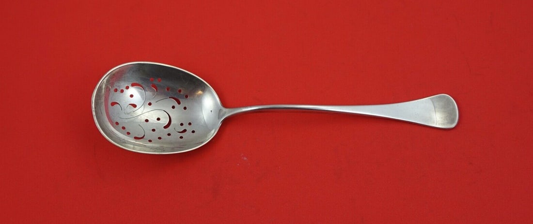 W & S Sorensen Patricia Sterling Silver Pierced Ice Spoon 8 1/4": W & S Sorensen Patricia Sterling Silver Pierced Ice Spoon 8 1/4" This exquisite ice spoon from the Patricia pattern by W & S Sorensen is crafted in sterling silver and measures 8 1/4 inches in length.