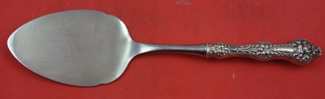 Alvin Old Orange Blossom Sterling Silver Pastry Server 11 1/4": Alvin Old Orange Blossom Sterling Silver Pastry Server 11 1/4" This exquisite pastry server is part of the Old Orange Blossom pattern by Alvin, crafted from high-quality sterling silver. Measuring 11