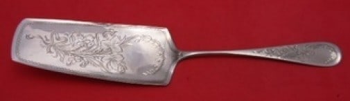 German Sterling Silver Brite-Cut Pie Server by Unknown: German Sterling Silver Brite-Cut Pie Server by Unknown This exquisite pie server showcases a classic German sterling silver design with a striking brite-cut finish. The server features an elegant patt