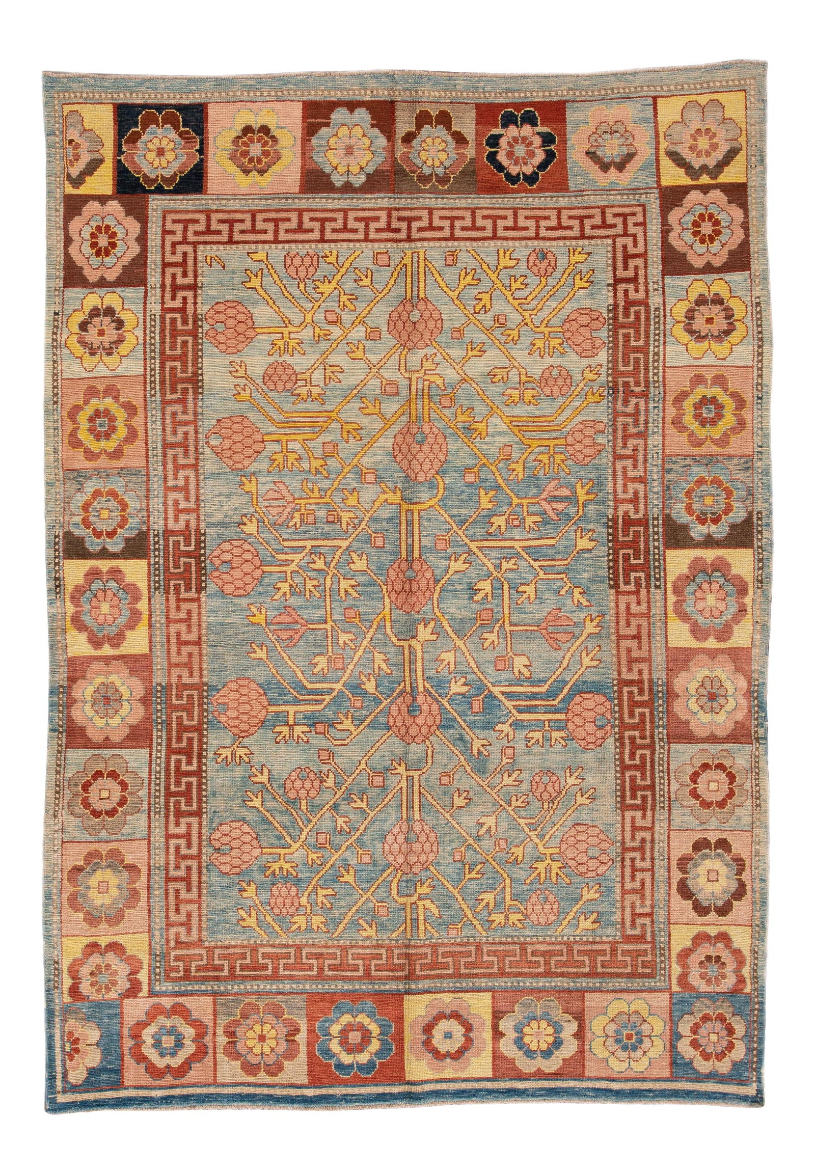 1990s Vintage Khotan Blue Hand-Knotted Wool Rug 6'7 x 9'4: 1990s Vintage Khotan Blue Hand-Knotted Wool Rug 6'7 x 9'4 Immerse yourself in the timeless elegance of this Vintage Khotan-style rug from the 1990s, meticulously hand-knotted from high-quality wool. F