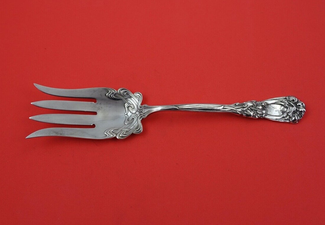 Durgin-Gorham Iris Sterling Silver Salad Serving Fork 9.25 inches: Durgin-Gorham Iris Sterling Silver Salad Serving Fork 9.25 inches This exquisite salad serving fork is crafted from sterling silver and features the elegant Iris pattern by Durgin-Gorham. Measuring 9