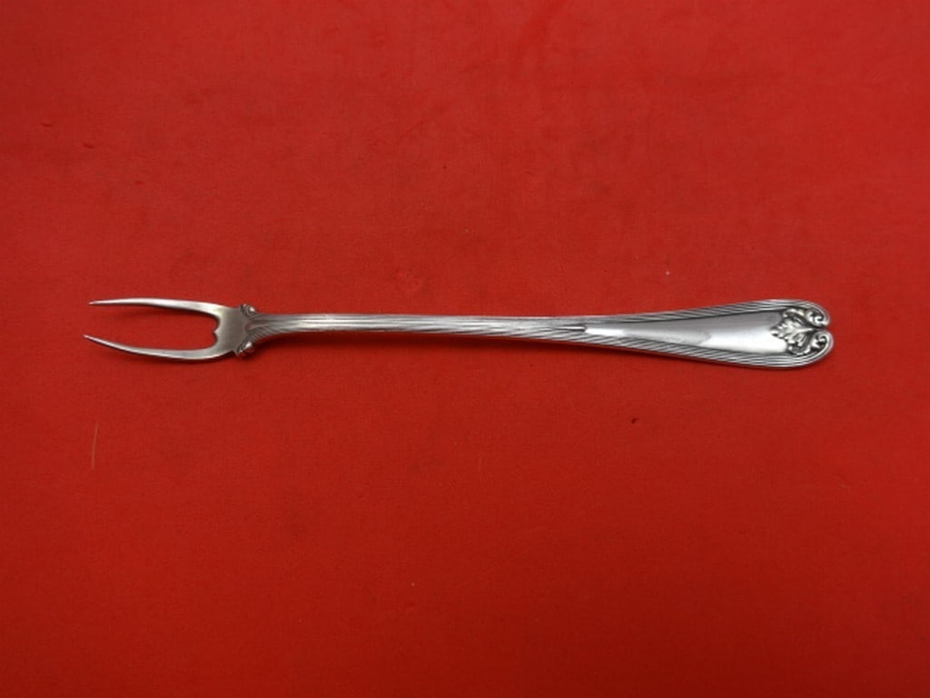 Tiffany & Co Colonial Sterling Silver 6 Inch 2-Tine Pickle Fork: Tiffany & Co Colonial Sterling Silver 6 Inch 2-Tine Pickle Fork This exquisite Colonial pickle fork by Tiffany & Co. is crafted from high-quality sterling silver. Measuring 6 inches in length, it feat