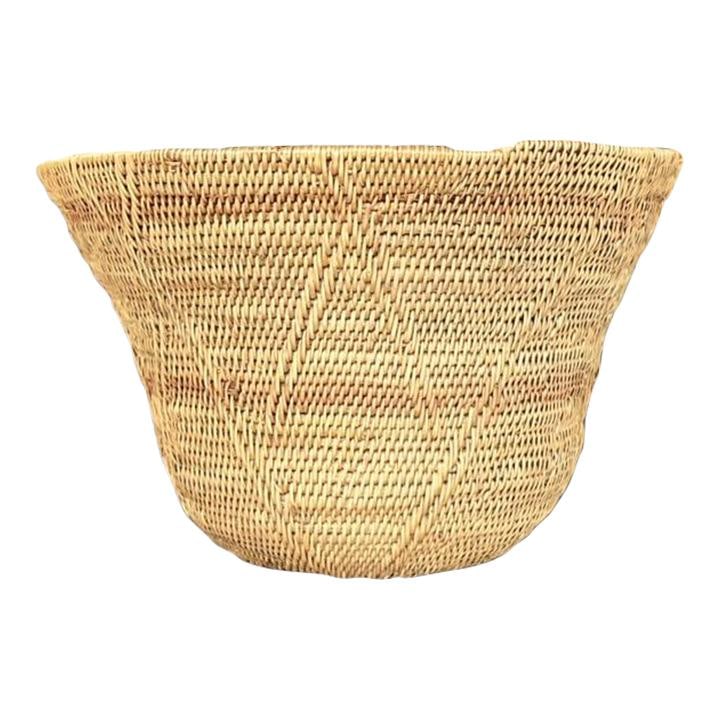 Vintage Coastal Rattan Charleston Basket 8x8x12.5 in Camel: Vintage Coastal Rattan Charleston Basket 8x8x12.5 in Camel Enhance your home decor with this Vintage Coastal Woven Rattan Charleston Basket. Crafted from beautifully woven rattan, this basket serves b