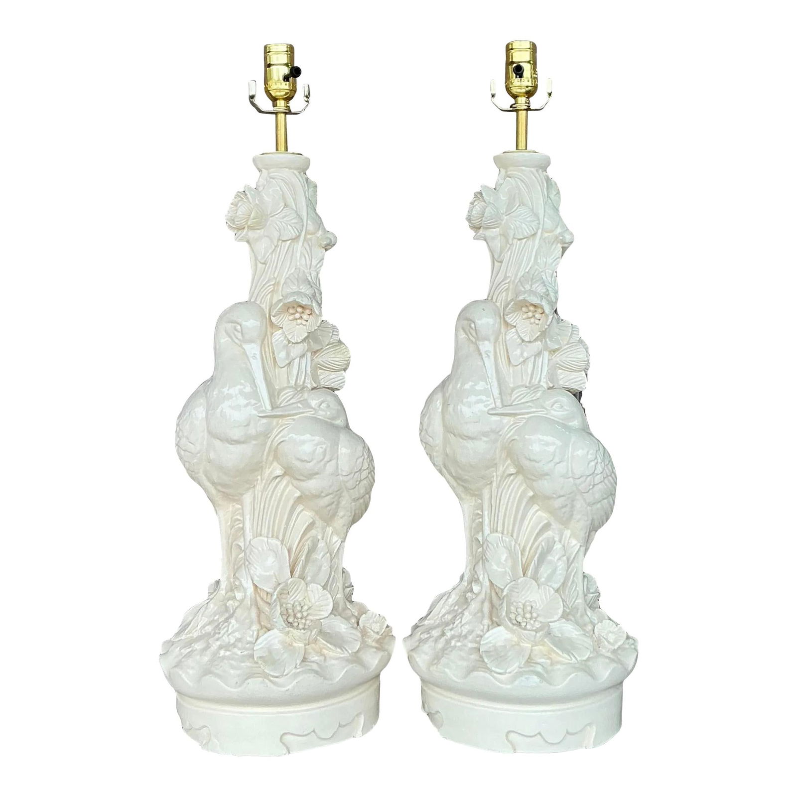 Elegant Vintage Regency Plaster Bird Lamps Pair Off-White 27.75": Elegant Vintage Regency Plaster Bird Lamps Pair Off-White 27.75" Enhance your decor with this pair of vintage Regency plaster bird lamps. Each lamp features intricately sculpted bird motifs resting on