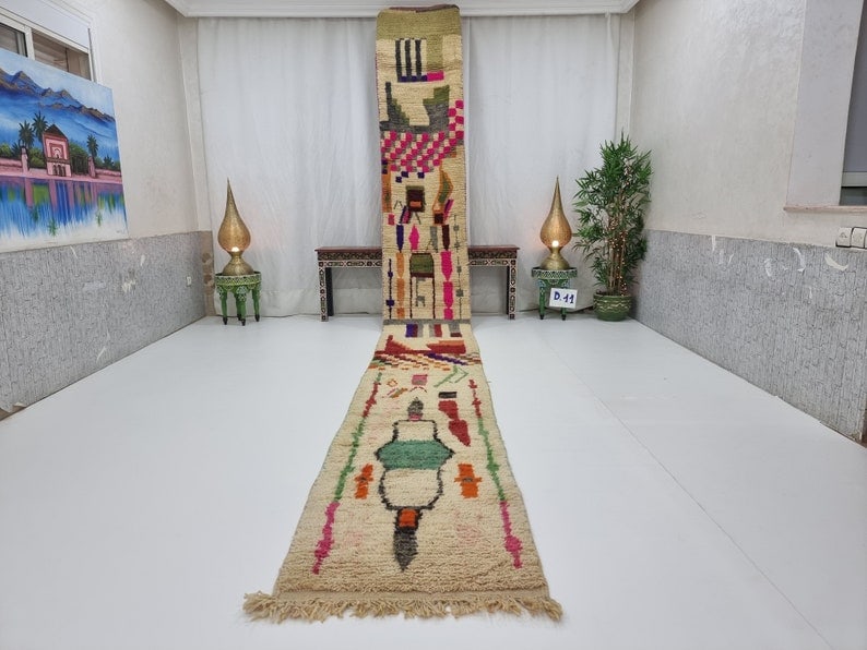 Authentic Handmade Moroccan Berber Runner Rug 2 x 19.68 Feet: Authentic Handmade Moroccan Berber Runner Rug 2 x 19.68 Feet Experience the beauty of authentic craftsmanship with this Elegant Colorful Runner Rug. Handwoven by local Berber women in the Middle Atlas