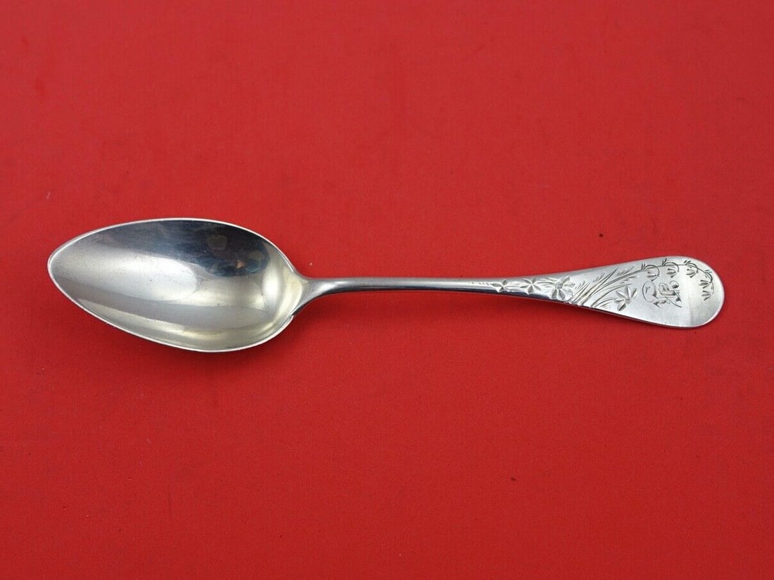 Wood & Hughes Sterling Silver Monogrammed Soup Spoon 7 1/4": Wood & Hughes Sterling Silver Monogrammed Soup Spoon 7 1/4" This elegant soup spoon by Wood and Hughes is crafted from high-quality sterling silver. Measuring 7 1/4 inches, it features a classic desig
