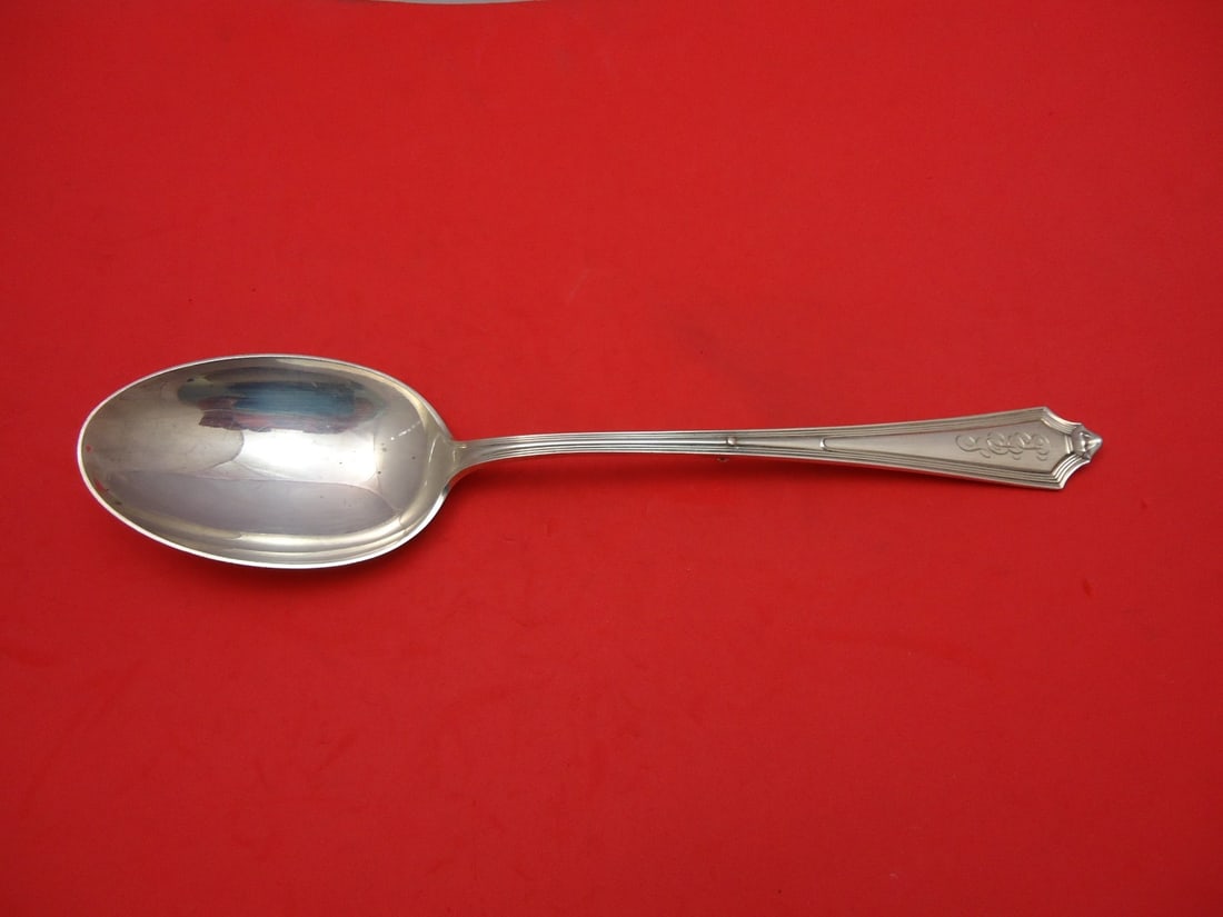 Gorham Plymouth Sterling Silver Serving Spoon 10 1/4" Button Design: Gorham Plymouth Sterling Silver Serving Spoon 10 1/4" Button Design Discover the elegance of the Plymouth pattern by Gorham with this exquisite sterling silver stuffing spoon. Measuring 10 1/4 inches,