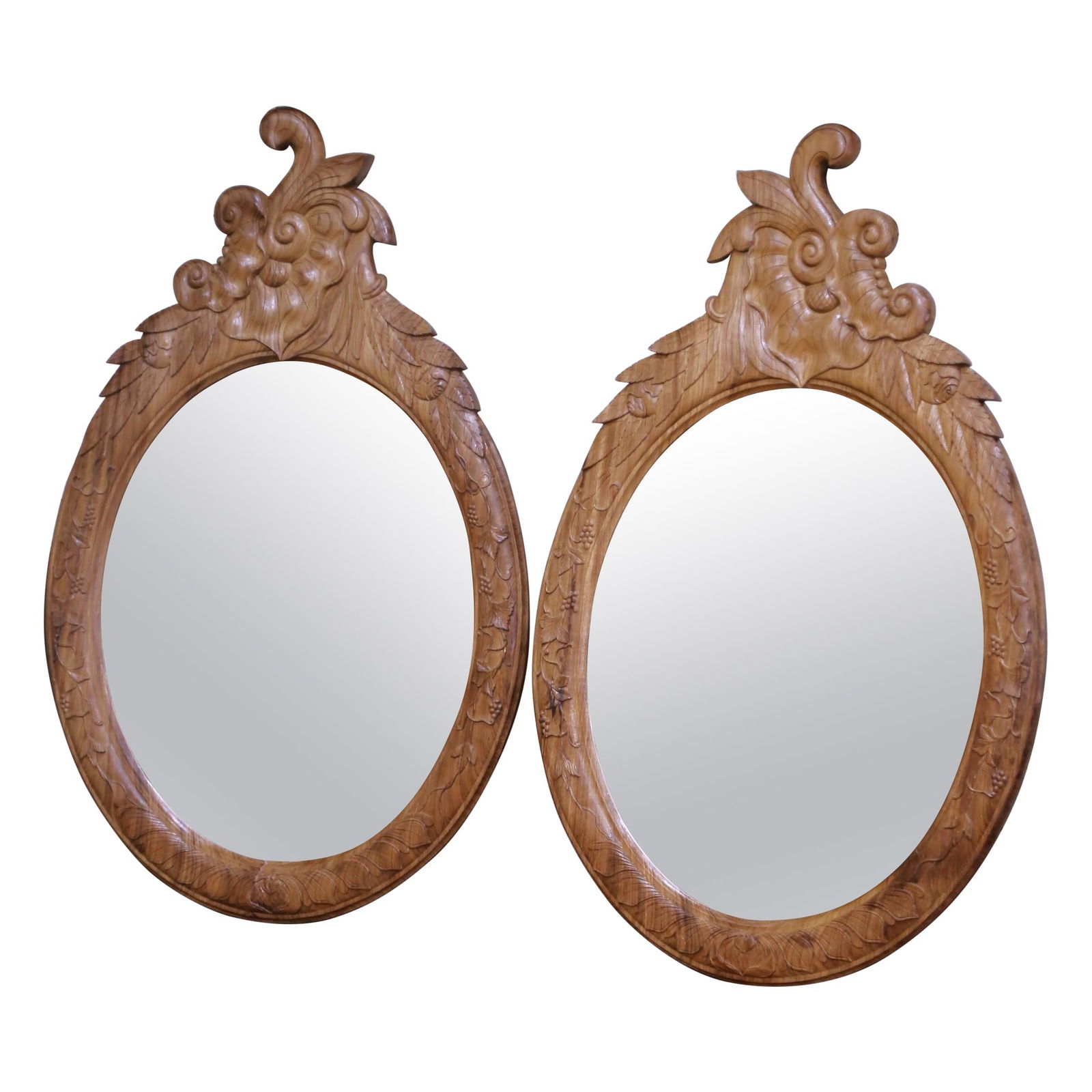 Set of 2 19th Century French Bleached Oak Oval Mirrors with Carved Grape Motifs: Set of 2 19th Century French Bleached Oak Oval Mirrors with Carved Grape Motifs This exquisite pair of 19th-century French oval mirrors features beautifully bleached oak frames adorned with intricatel