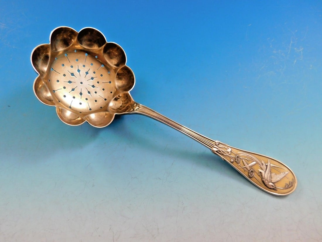 Tiffany & Co Japanese Sterling Silver Sugar Sifter 7 Light Vermeil: Tiffany & Co Japanese Sterling Silver Sugar Sifter 7 Light Vermeil This exquisite sugar sifter by Tiffany & Co. showcases the renowned Japanese pattern, designed in 1871 during a groundbreaking era fo