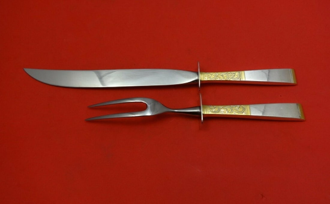 Gorham Golden Scroll Sterling Silver Steak Carving Set 2-Piece: Gorham Golden Scroll Sterling Silver Steak Carving Set 2-Piece Enhance your dining experience with the exquisite Golden Scroll Steak Carving Set by Gorham. This 2-piece serving set features a sterling