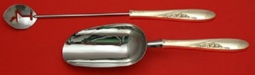 Easterling Rose Spray Sterling Silver 2pc Bar Serving Set: Easterling Rose Spray Sterling Silver 2pc Bar Serving Set This exquisite 2-piece bar serving set features the elegant Rose Spray pattern by Easterling. Made from high-quality sterling silver, this cus