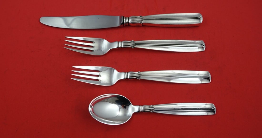 W&S Sorensen Lotus Sterling Silver 4-Piece Place Setting: W&S Sorensen Lotus Sterling Silver 4-Piece Place Setting Enhance your dining experience with this exquisite 4-piece place setting from the Lotus pattern by W&S Sorensen. Crafted from high-quality ster