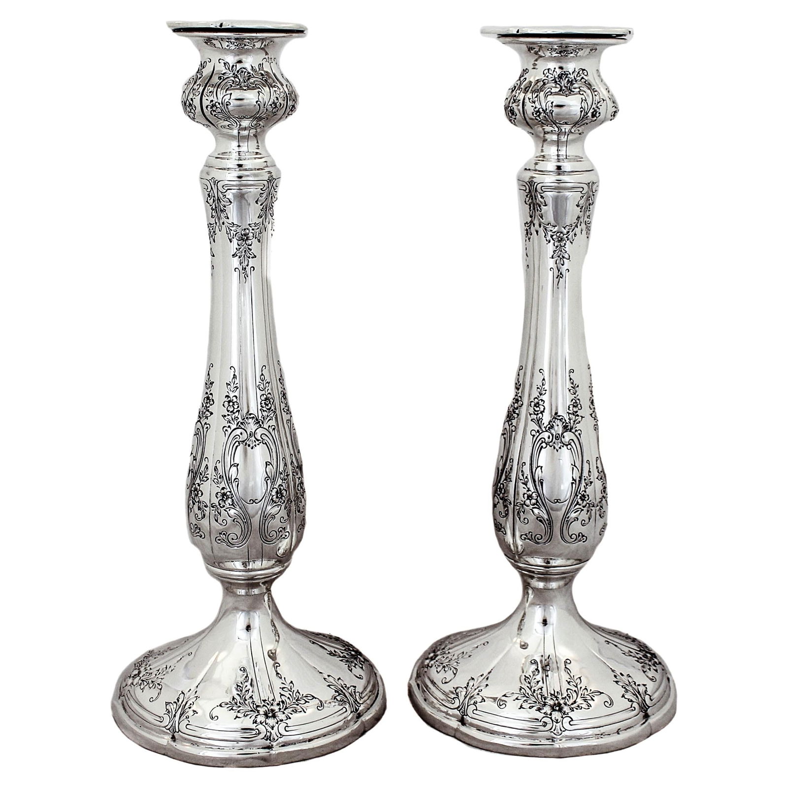 Set of 2 Concord Silversmiths Sterling Silver Candlesticks 12 inches Circa 1900: Set of 2 Concord Silversmiths Sterling Silver Candlesticks 12 inches Circa 1900 Enhance your home decor with this stunning pair of Sterling Silver Candlesticks, each standing at an impressive 12 inche