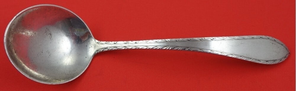 Tiffany & Co Feather Edge Sterling Silver Gravy Ladle 6 5/8 inches: Tiffany & Co Feather Edge Sterling Silver Gravy Ladle 6 5/8 inches This exquisite gravy ladle features the elegant Feather Edge pattern by Tiffany & Co. Crafted from high-quality sterling silver, it s