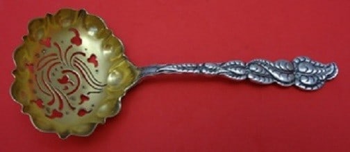 Tiffany and Co Ailanthus Sterling Silver Sugar Sifter Goldwashed 5 3/4 inches: Tiffany and Co Ailanthus Sterling Silver Sugar Sifter Goldwashed 5 3/4 inches This exquisite sugar sifter from Tiffany and Co. features the elegant Ailanthus pattern and is crafted from sterling silve