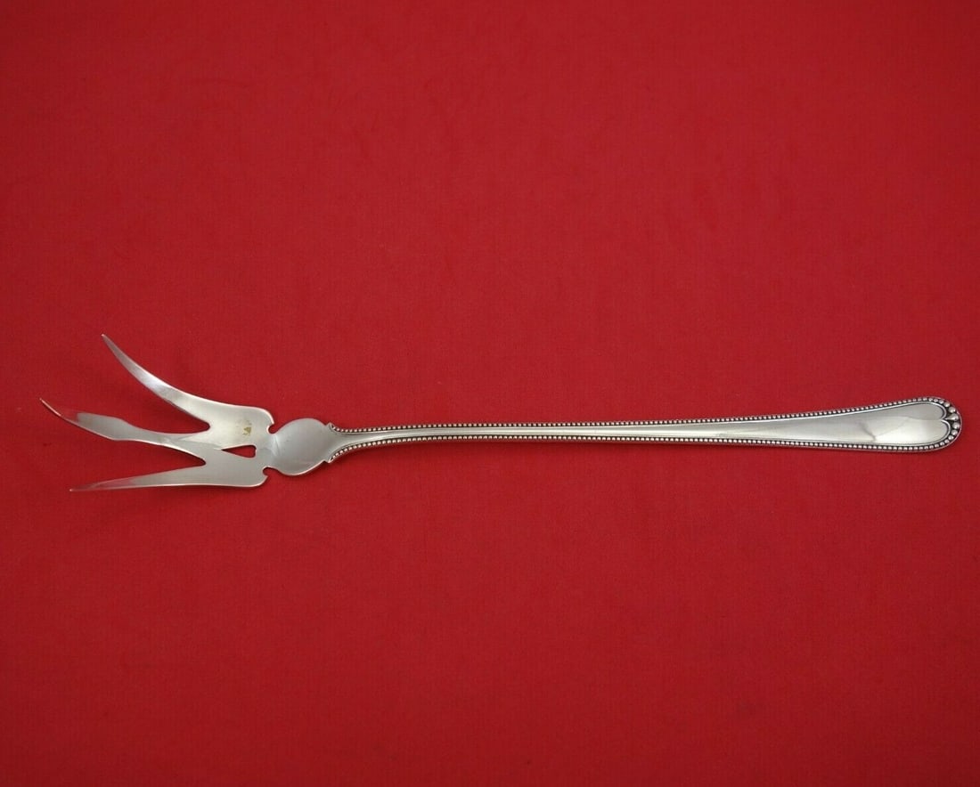Antique 9 Inch Gorham Sterling Silver Lettuce Fork Newcastle Pattern: Antique 9 Inch Gorham Sterling Silver Lettuce Fork Newcastle Pattern This exquisite 9" lettuce fork is crafted from sterling silver and features the elegant Newcastle pattern by Gorham. Dating back to