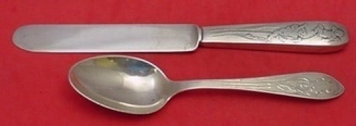 Tiffany & Co. Sterling Silver Junior Set 2pc Knife Spoon Monogrammed: Tiffany & Co. Sterling Silver Junior Set 2pc Knife Spoon Monogrammed This Tiffany & Co. Sterling Silver Junior Set includes a 2-piece knife measuring 7 7/8 inches and a spoon measuring 6 1/8 inches. E