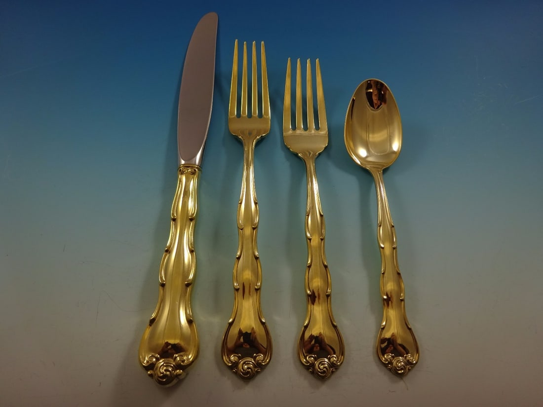 Gorham Rondo Gold Sterling Silver Flatware Set 48 Pcs for 12: Gorham Rondo Gold Sterling Silver Flatware Set 48 Pcs for 12 Elevate your dining experience with the Rondo Gold by Gorham Sterling Silver Flatware Set, designed to serve 12. This exquisite set compris
