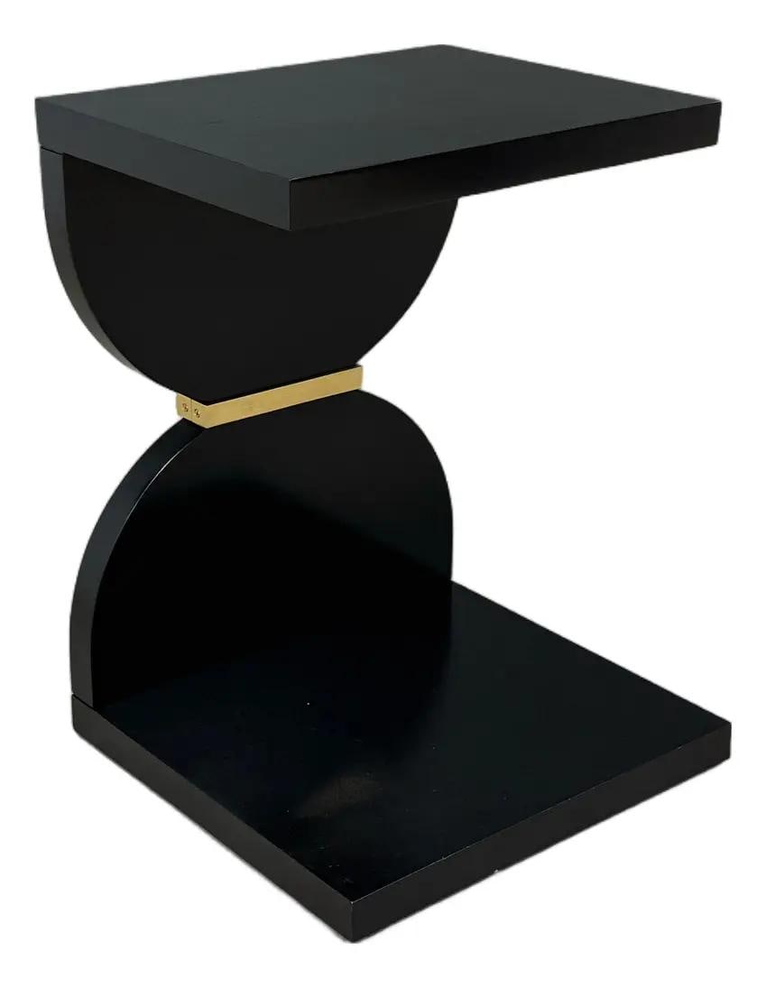 J. Banks Blake Black Lacquer Occasional End Table 2022: J. Banks Blake Black Lacquer Occasional End Table 2022 This modern black lacquer Blake occasional end table showcases a sleek design crafted from solid maple with polished brass accents. The piece is