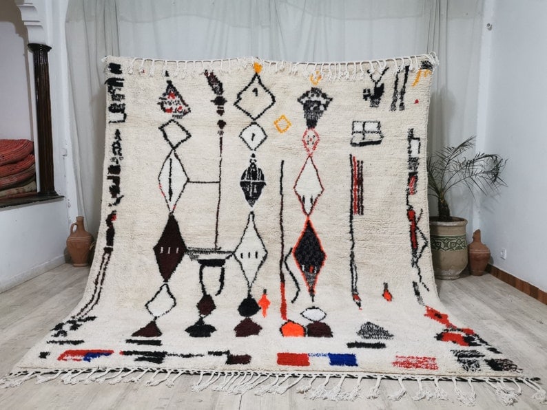 Authentic Handmade Moroccan Berber Rug 9.84 x 6.56 Feet: Authentic Handmade Moroccan Berber Rug 9.84 x 6.56 Feet Discover the beauty of this stunning authentic soft white handmade Moroccan Berber rug. Skillfully handwoven in the Atlas Mountains by local Ber