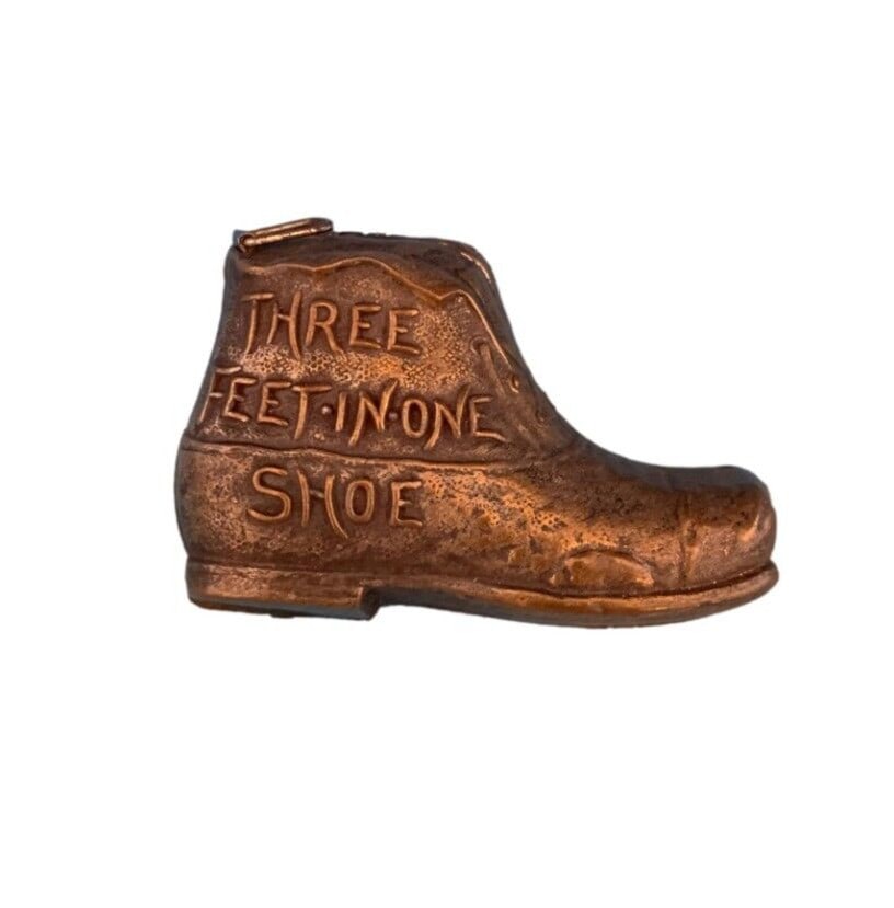 Vintage Metal Shoe Measuring Tape 3 Feet Unique Design: Vintage Metal Shoe Measuring Tape 3 Feet Unique Design This vintage measuring tape features a unique metal shoe design, measuring 1 1/2" tall. It reads, "three feet in one shoe," and extends to three