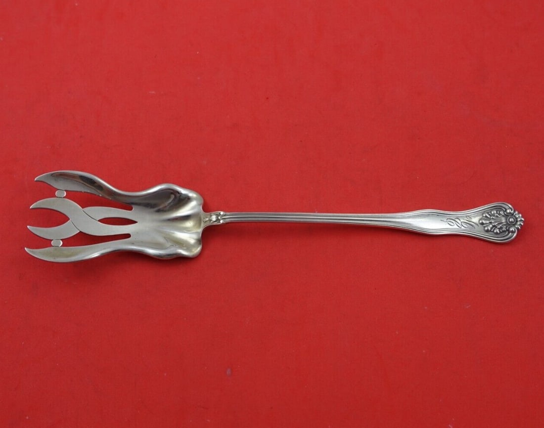 Dominick & Haff Alexandra Sterling Silver Lettuce Fork 8 5/8": Dominick & Haff Alexandra Sterling Silver Lettuce Fork 8 5/8" This exquisite serving fork from the Alexandra pattern, crafted by Dominick & Haff, showcases timeless elegance and quality. Made from ste