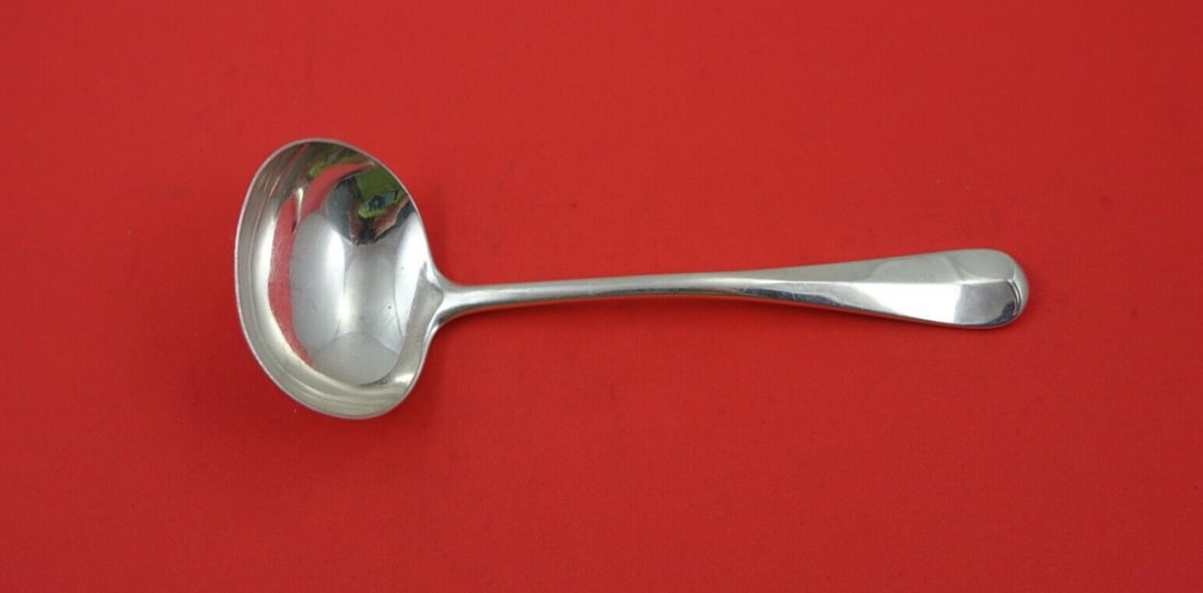 Worcester Sterling Silver Rat Tail Gravy Ladle 7 1/4 Inches: Worcester Sterling Silver Rat Tail Gravy Ladle 7 1/4 Inches This exquisite gravy ladle features the classic Rat Tail pattern by Worcester, crafted from high-quality sterling silver. Measuring 7 1/4 in
