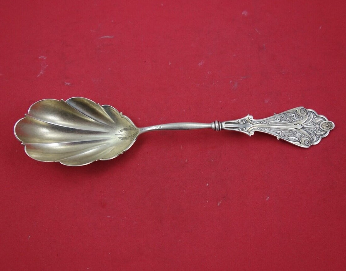 George Sharp Corinthian Sterling Silver Berry Spoon Gold Washed Brite-Cut 8 5/8": George Sharp Corinthian Sterling Silver Berry Spoon Gold Washed Brite-Cut 8 5/8" This exquisite serving spoon is a sterling silver berry spoon from the Corinthian pattern by George Sharp. Crafted with