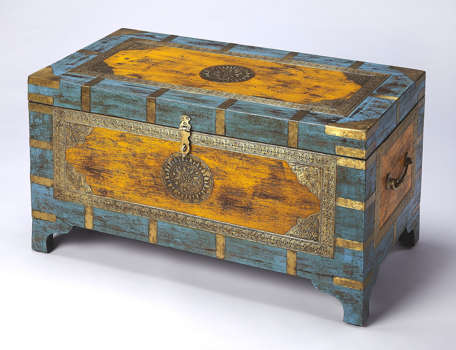 Butler Mango Wood Storage Trunk with Brass Inlays Indian Style: Butler Mango Wood Storage Trunk with Brass Inlays Indian Style This stylish storage trunk is expertly crafted from mango wood and features elegant brass inlays, making it a perfect addition to any hom
