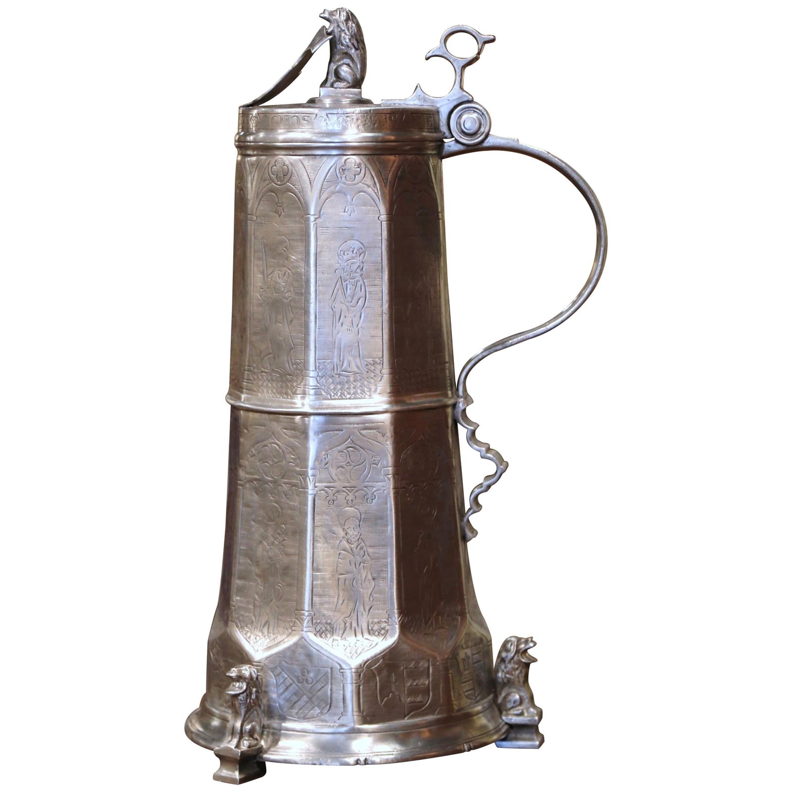 Italian Pewter Beer Stein with Lion Feet and Engraved Decor 21in: Italian Pewter Beer Stein with Lion Feet and Engraved Decor 21in This exquisite Vintage Italian Pewter Beer Stein is a stunning addition to any wine cellar or wet bar. Hand-crafted in Italy circa 2000