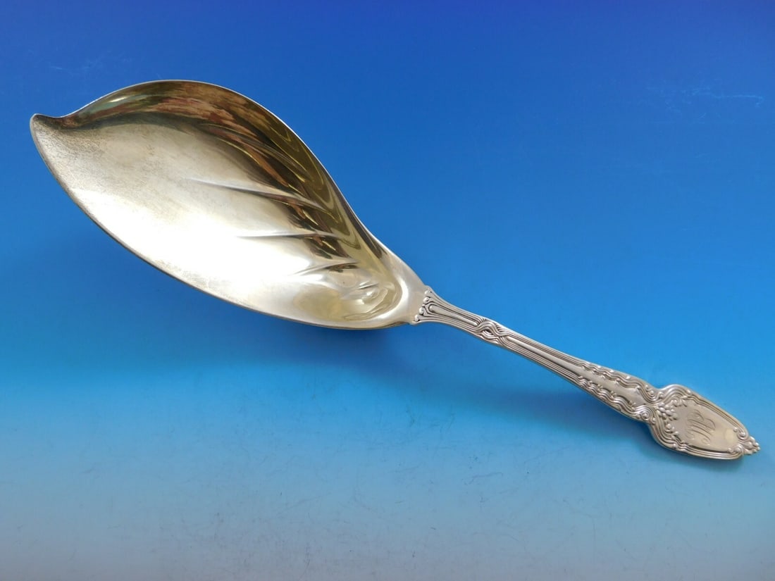 Tiffany & Co. Broom Corn Sterling Silver Ice Cream Server 11.5" Gold-Washed Blade: Tiffany & Co. Broom Corn Sterling Silver Ice Cream Server 11.5" Gold-Washed Blade This exquisite ice cream server from Tiffany & Co. features a stunning gold-washed dolphin-shaped blade and is crafted
