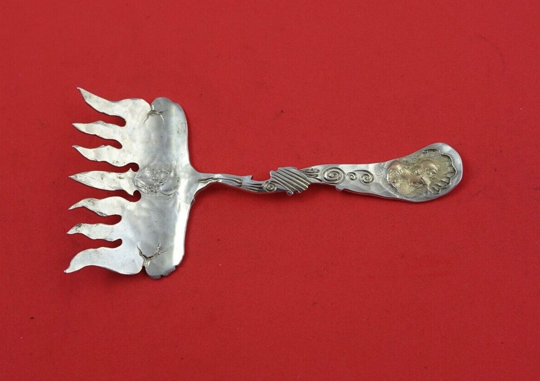 Shiebler Medallion Etruscan Sterling Silver Sardine Fork Gold Maiden 4 5/8": Shiebler Medallion Etruscan Sterling Silver Sardine Fork Gold Maiden 4 5/8" This exquisite sardine fork from the renowned Shiebler brand features the Medallion pattern, also known as Etruscan or Homer