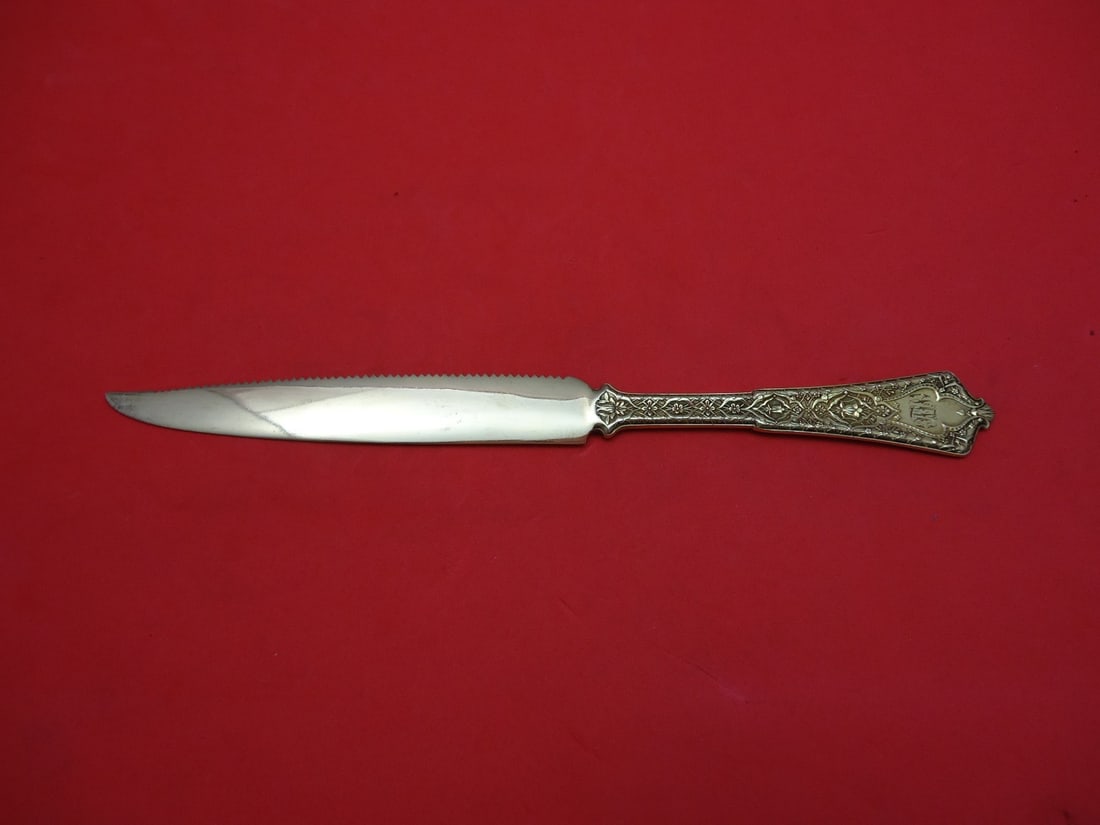 Tiffany & Co. Persian Sterling Silver Vermeil Fruit Knife 7 3/4" Serrated: Tiffany & Co. Persian Sterling Silver Vermeil Fruit Knife 7 3/4" Serrated This exquisite fruit knife from the Persian pattern by Tiffany & Co. features a serrated blade crafted from sterling silver wi