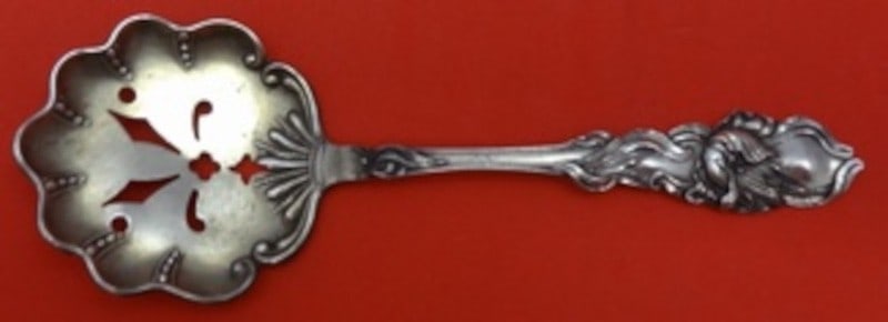 Sterling Silver Pierced Nut Spoon Tulip Pattern by Fessenden 5.5 Inch: Sterling Silver Pierced Nut Spoon Tulip Pattern by Fessenden 5.5 Inch This is a sterling silver nut spoon in the Tulip pattern by Fessenden. The spoon features a pierced design, measures 5 1/2 inches