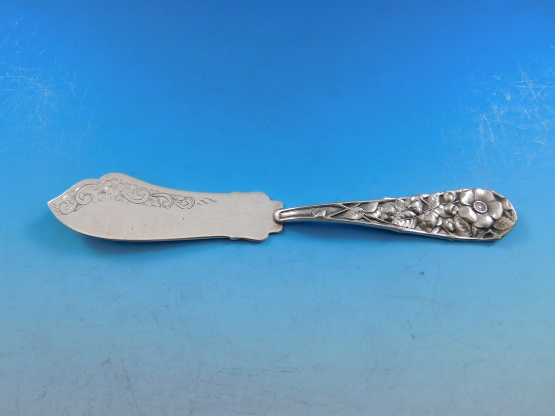 Gorham Eglantine Sterling Silver Master Butter Knife Brite-Cut 7 1/4 Inch: Gorham Eglantine Sterling Silver Master Butter Knife Brite-Cut 7 1/4 Inch This exquisite master butter knife from the Eglantine pattern by Gorham features a beautifully crafted sterling silver flat ha