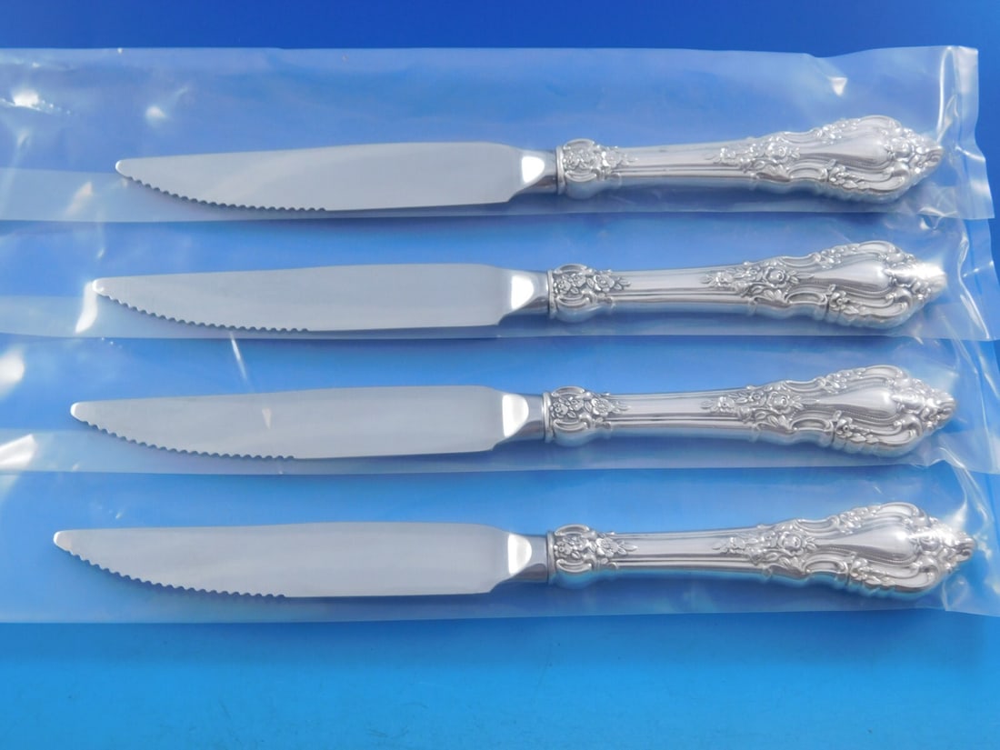 Lunt Eloquence Sterling Silver Steak Knife Set 4pc Custom 8 7/8": Lunt Eloquence Sterling Silver Steak Knife Set 4pc Custom 8 7/8" Enhance your dining experience with this elegant 4-piece steak knife set from the Eloquence pattern by Lunt. Each knife features a ster