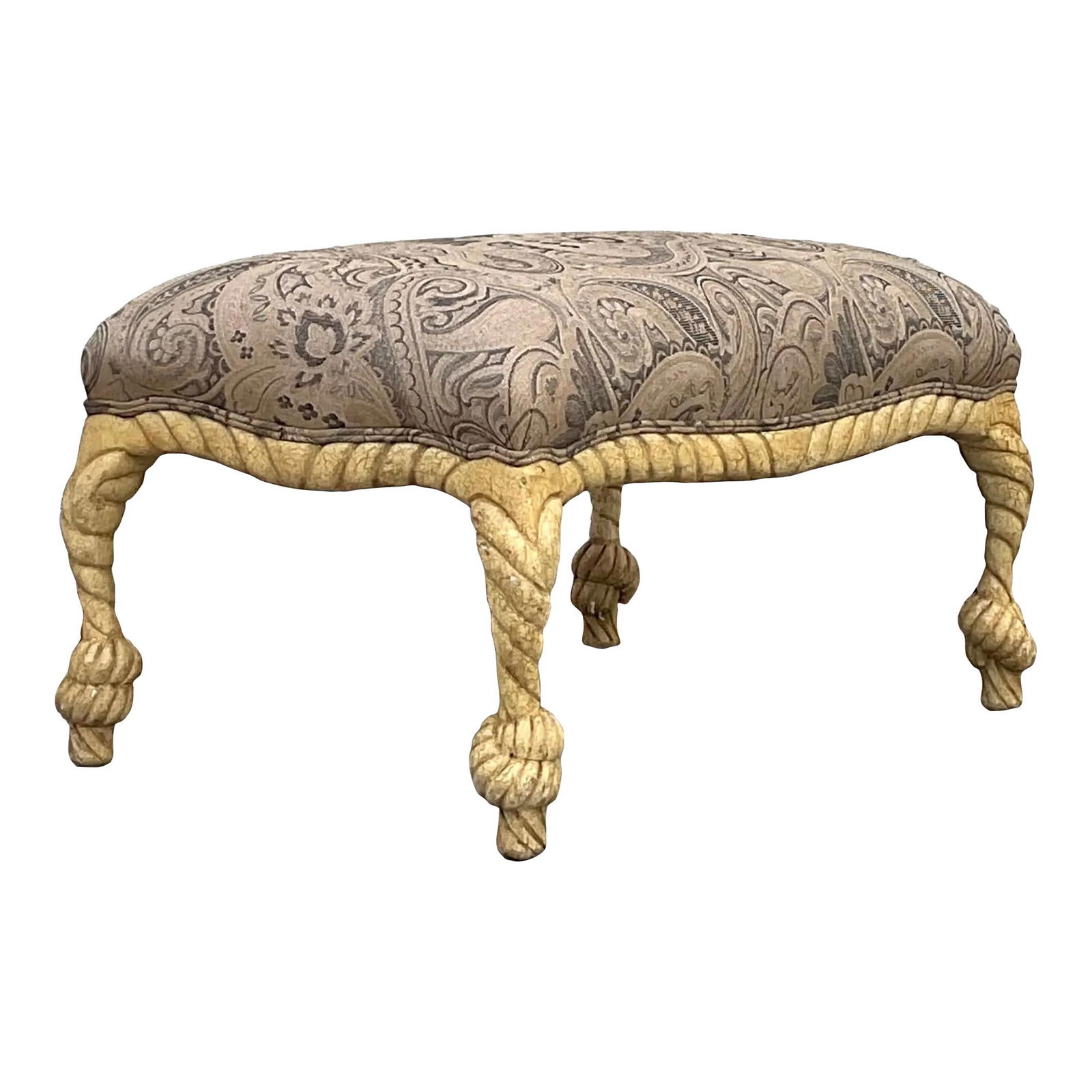 Vintage Regency Ottoman with Rope Tassel Motif in Beige: Vintage Regency Ottoman with Rope Tassel Motif in Beige Enhance your living space with the exquisite Vintage Regency Rope Tassel Ottoman. This stunning piece showcases an intricately carved frame ador