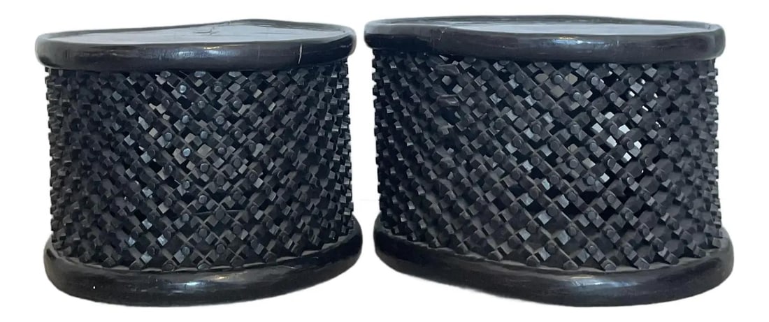 Set of 2 Vintage Bamileke Carved Wood Tables: Set of 2 Vintage Bamileke Carved Wood Tables Enhance your living space with this exceptional set of two vintage Bamileke tables, expertly hand-carved from a single piece of solid wood. Originating fro
