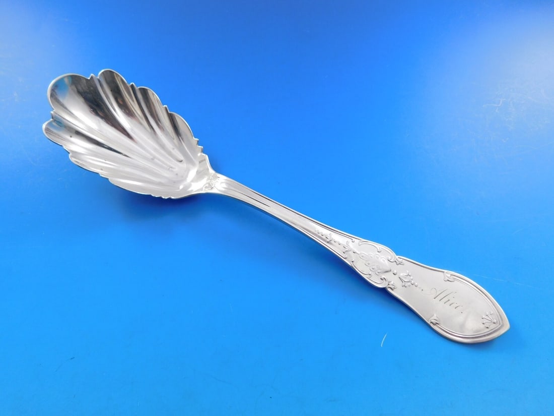 Shiebler Dew Drop Sterling Silver Sugar Spoon 7 1/8" Circa 1860: Shiebler Dew Drop Sterling Silver Sugar Spoon 7 1/8" Circa 1860 Discover a stunning piece of history with this Dew Drop sugar spoon by Shiebler, crafted in sterling silver around 1860. Featuring a bea