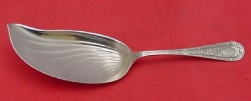 Whiting Laureate Sterling Silver Fluted Ice Cream Server 8 3/4 in: Whiting Laureate Sterling Silver Fluted Ice Cream Server 8 3/4 in Presenting the Laureate Ice Cream Server from Whiting, crafted from exquisite sterling silver. This elegant serving piece features a f