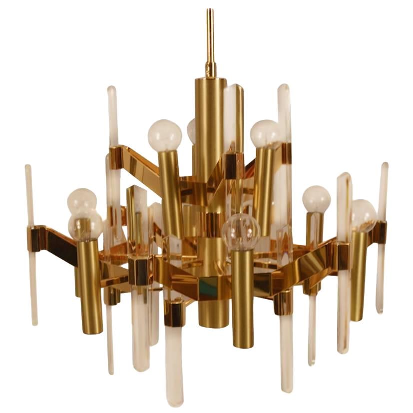 Gaetano Sciolari Nine-Light Brass Crystal Chandelier Gold Wash: Gaetano Sciolari Nine-Light Brass Crystal Chandelier Gold Wash Illuminate your space with this stunning nine-light chandelier by renowned designer Gaetano Sciolari. Crafted from brass and adorned with
