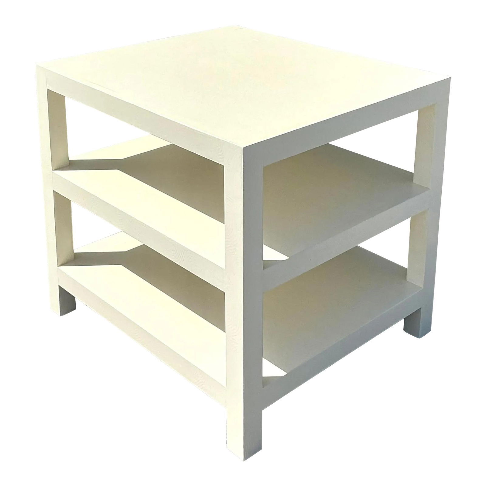 Elegant Vintage Regency Lacquered Side Table with Open Shelving: Elegant Vintage Regency Lacquered Side Table with Open Shelving This elegant vintage Regency side table showcases a sophisticated stacked design, enhanced by a creamy lacquered finish that adds to its