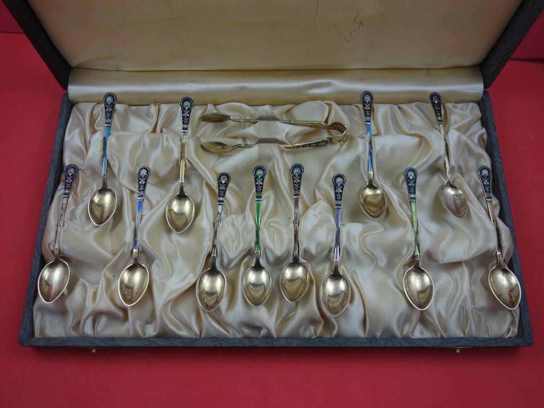Norwegian Sterling Silver Enamel Coffee Spoon & Tongs 13-pc Set in Box: Norwegian Sterling Silver Enamel Coffee Spoon & Tongs 13-pc Set in Box This exquisite 13-piece Norwegian Sterling Silver coffee spoon and tongs set features a stunning enamel finish and is presented i