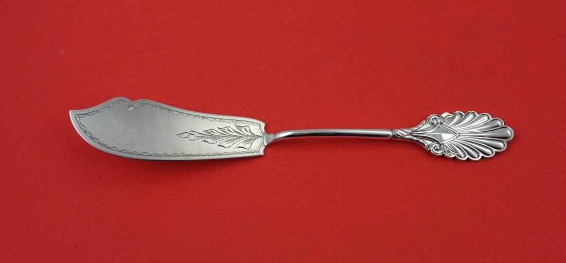 Grecian by Gorham Sterling Silver Master Butter Knife 7 3/8 in Brite-Cut Engraving: Grecian by Gorham Sterling Silver Master Butter Knife 7 3/8 in Brite-Cut Engraving Enhance your dining experience with this exquisite Grecian Master Butter Knife by Gorham. Crafted from sterling silve