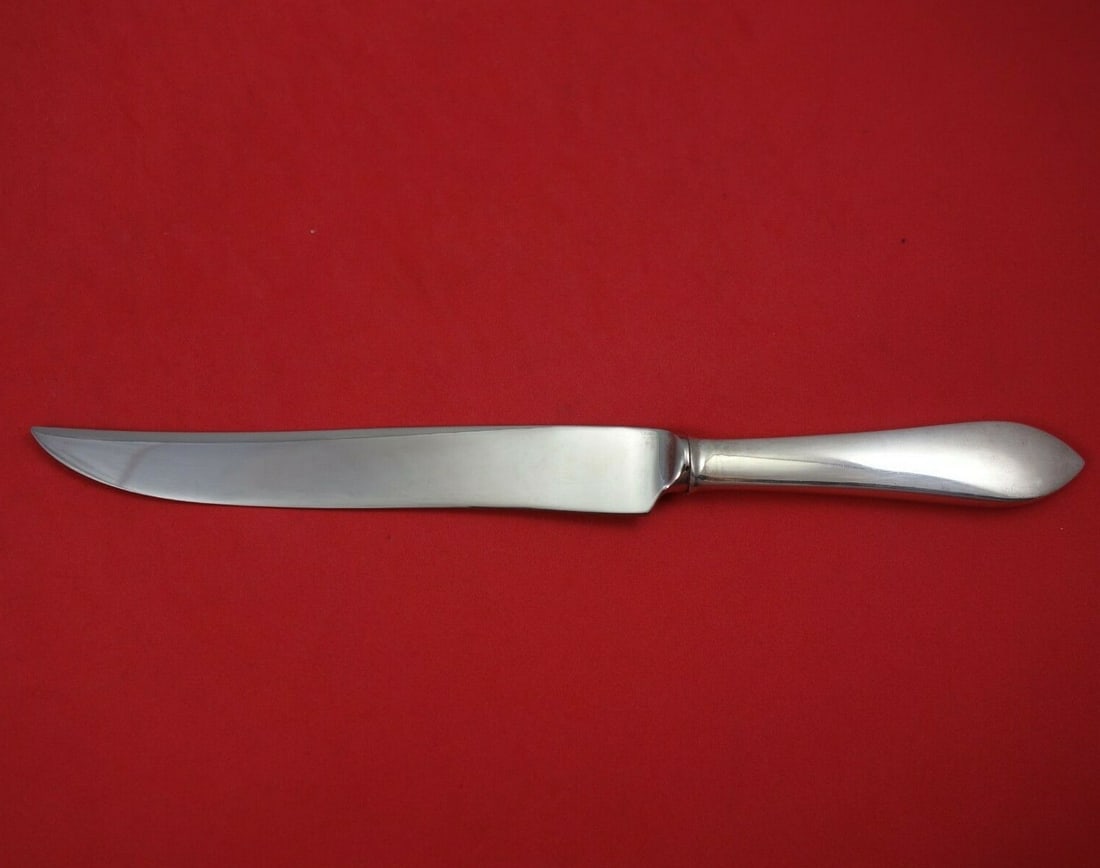 Tiffany & Co Faneuil Sterling Silver Steak Knife 9 3/4" Hollow Handle: Tiffany & Co Faneuil Sterling Silver Steak Knife 9 3/4" Hollow Handle This Faneuil steak knife by Tiffany & Co. features a stunning design, crafted from high-quality sterling silver with a hollow hand