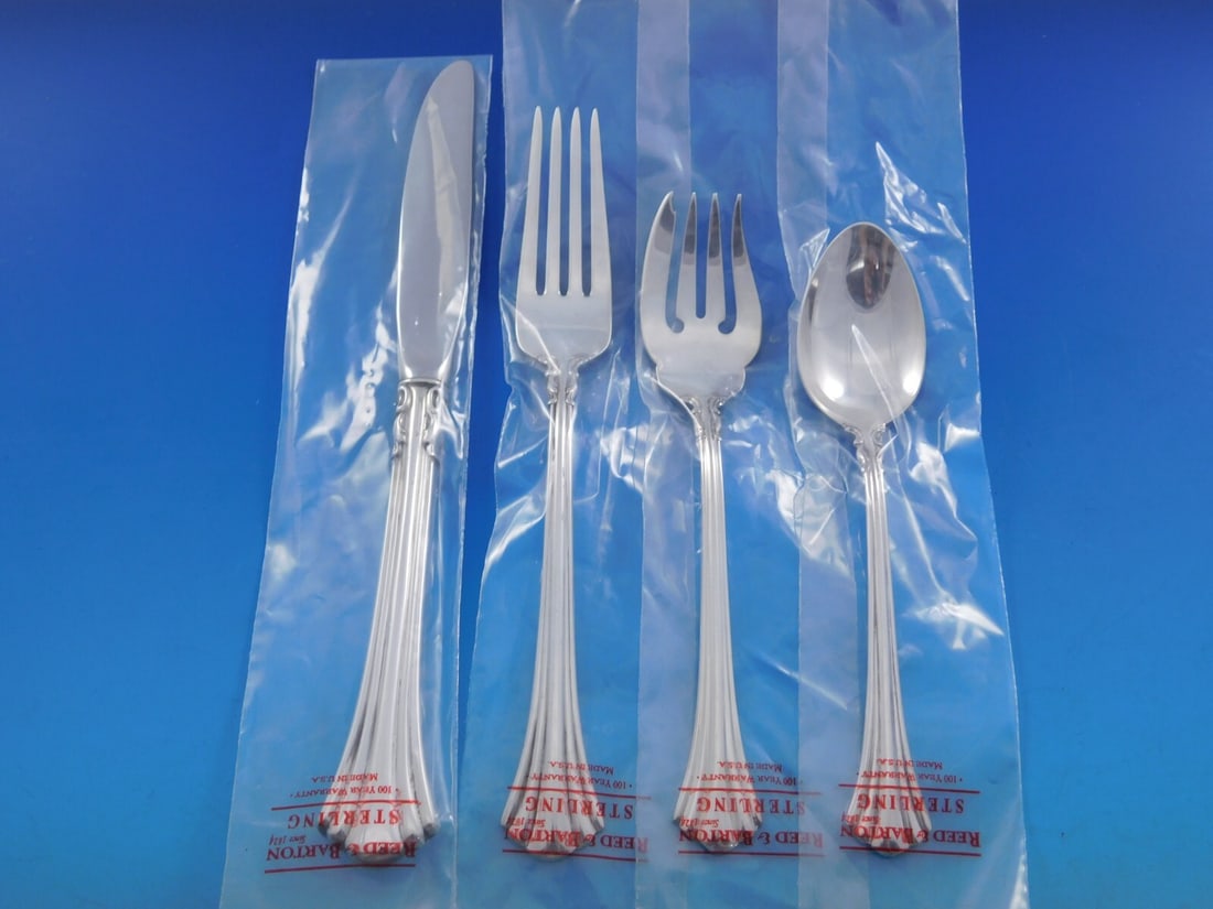 Reed & Barton Eighteenth Century Sterling Silver Flatware Set 32 pcs with Storage Chest: Reed & Barton Eighteenth Century Sterling Silver Flatware Set 32 pcs with Storage Chest Elevate your dining experience with this exquisite Eighteenth Century flatware set by Reed & Barton. Crafted fro
