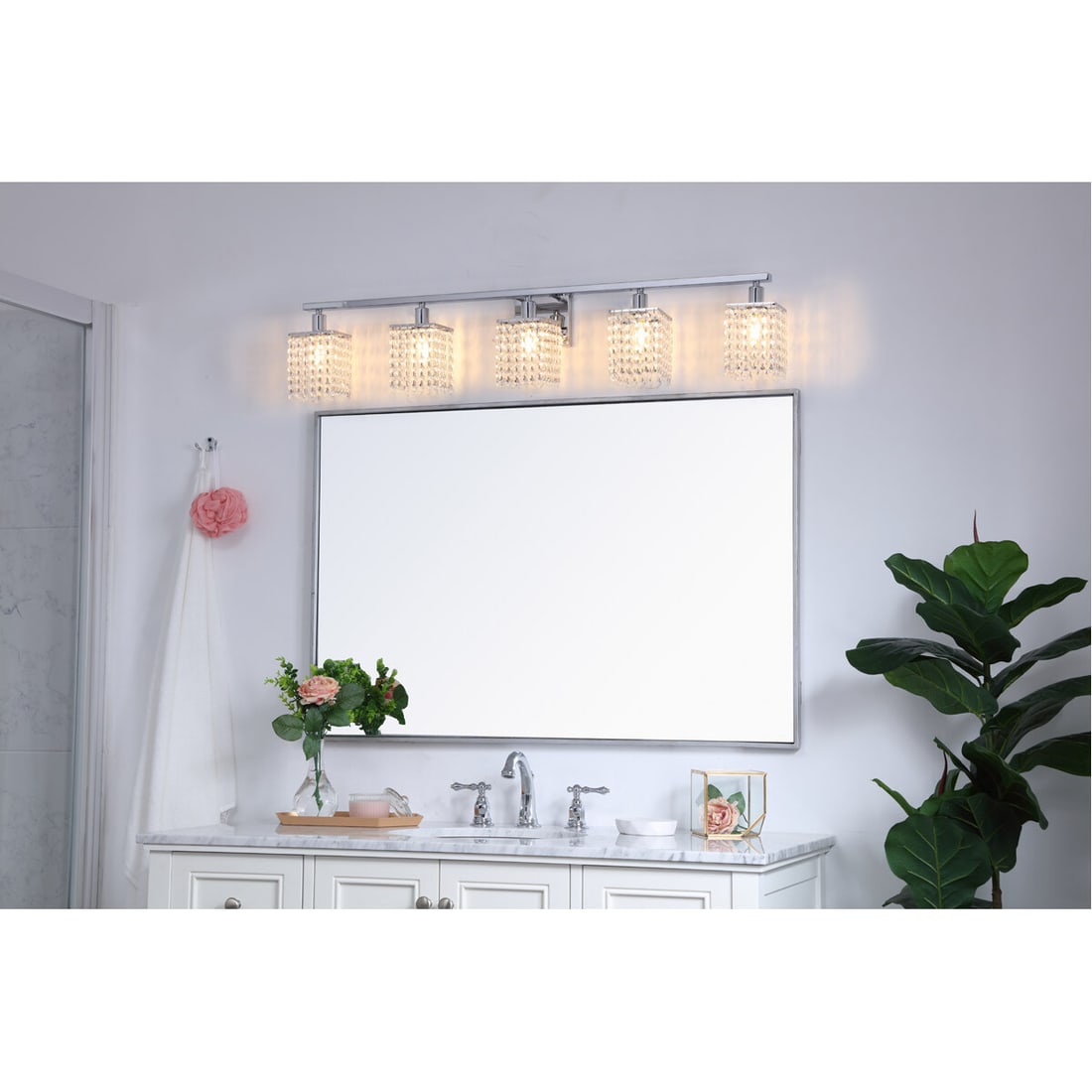 Phineas 5 Light Chrome Wall Sconce 42 inch with Crystals: Phineas 5 Light Chrome Wall Sconce 42 inch with Crystals Illuminate your space with this stunning 42-inch Crystal Wall Sconce Light Fixture, designed in a modern style with a polished chrome finish. T